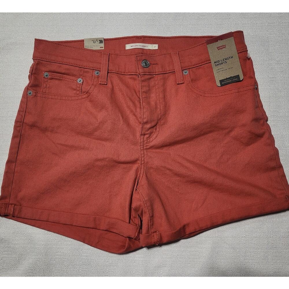 Levi's mid length shorts orange Waist 31'' length 13''